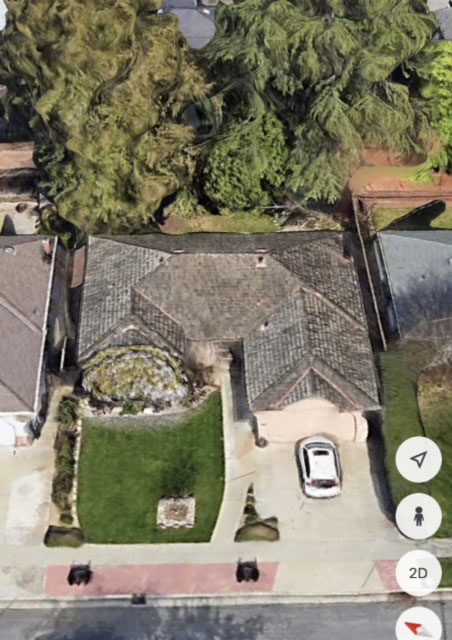 Before image of a Good Vibes Roofing and Siding Inc. project - top view of the same residential roof that is very dirty and worn-out